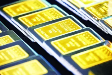 استقرار الذهب مع صعود الدولار قبل فرض رسوم جمركية جديدة